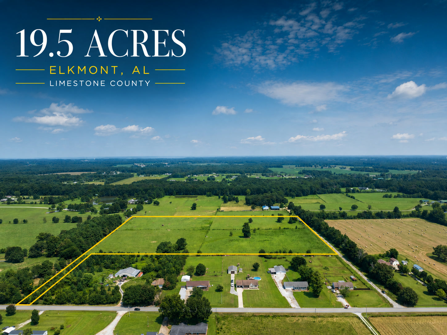 Road-facing aerial view of the 19.5-acre Elkmont property with an illustrative yellow parcel outline